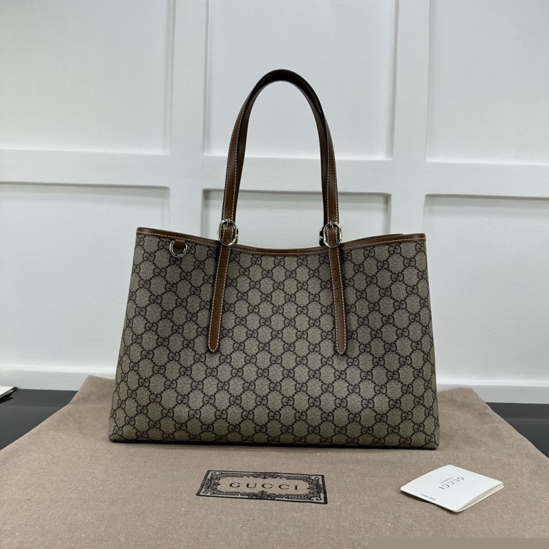 G*u*i shopping bags